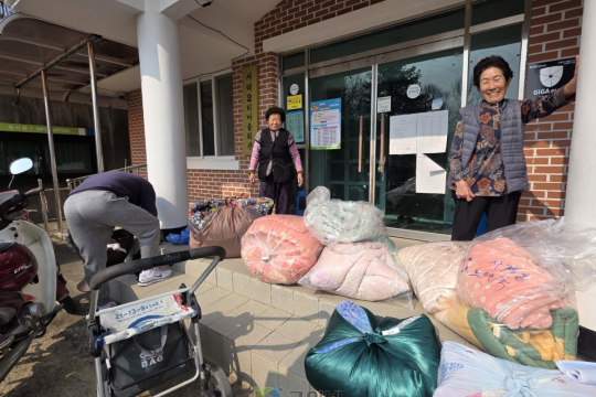 군위군자원봉사센터, 뽀송이불! 찾아가는 고향사랑 세탁서비스 이미지
